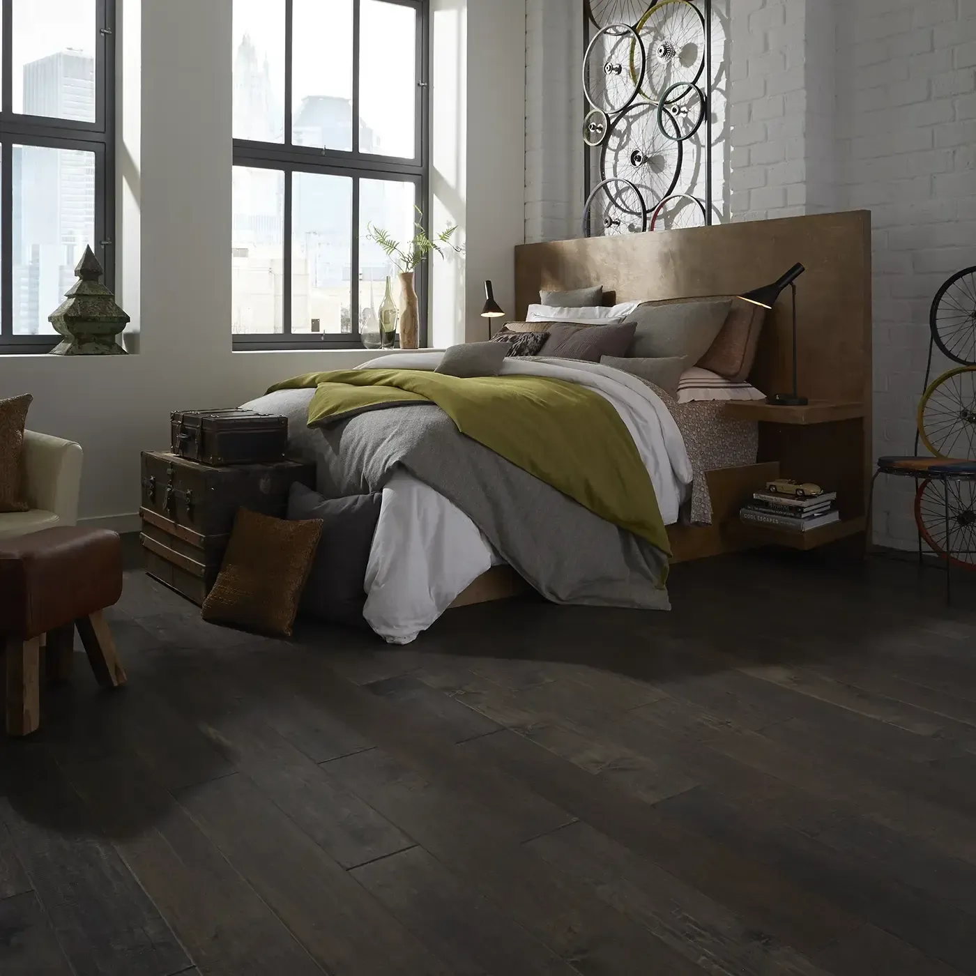 YukonMapleII-SW548-05002-Timberwolf-BedRm Dark hardwood in a modern bedroom with a large bed | Carpets of Dalton