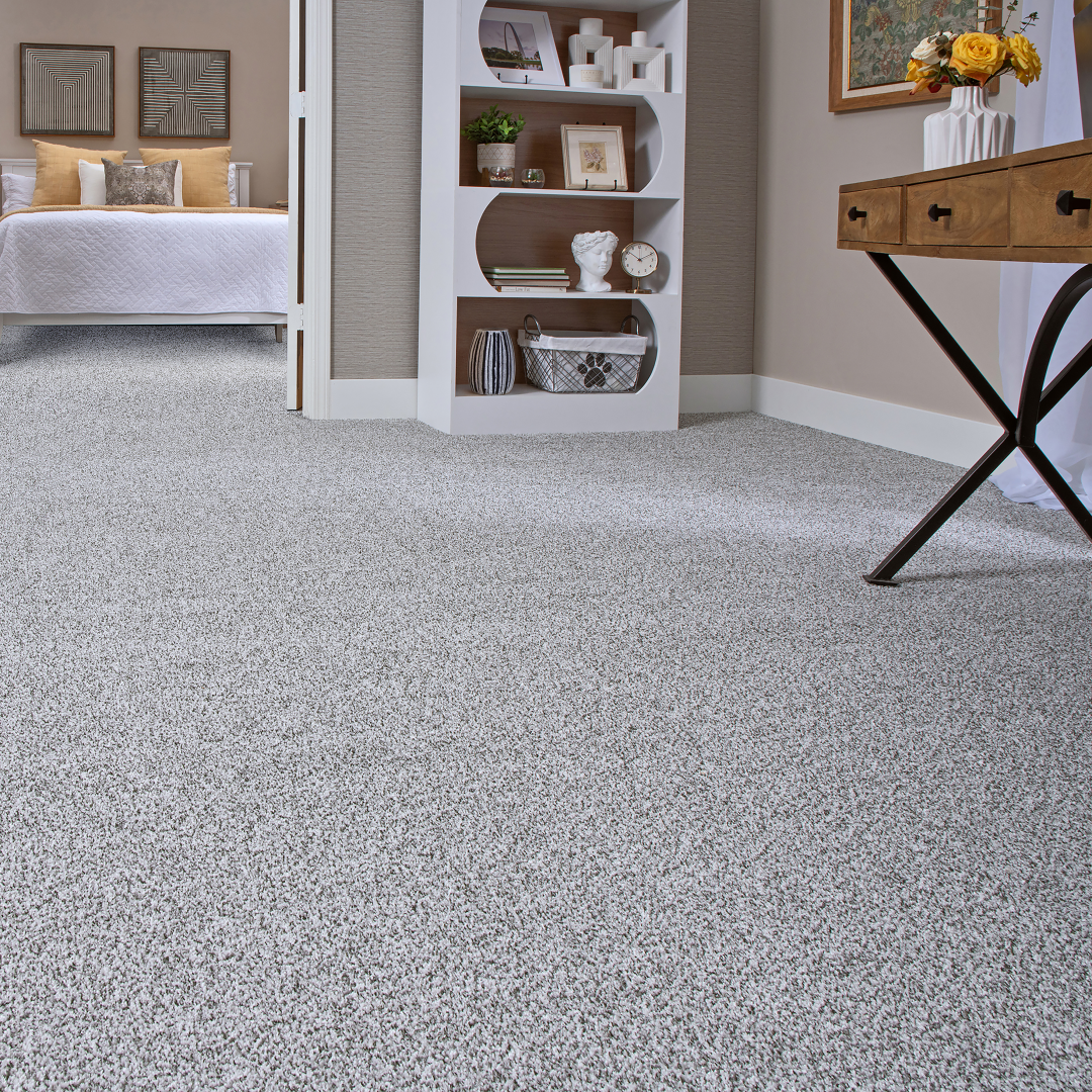 Light gray carpet flooring in a modern bedroom