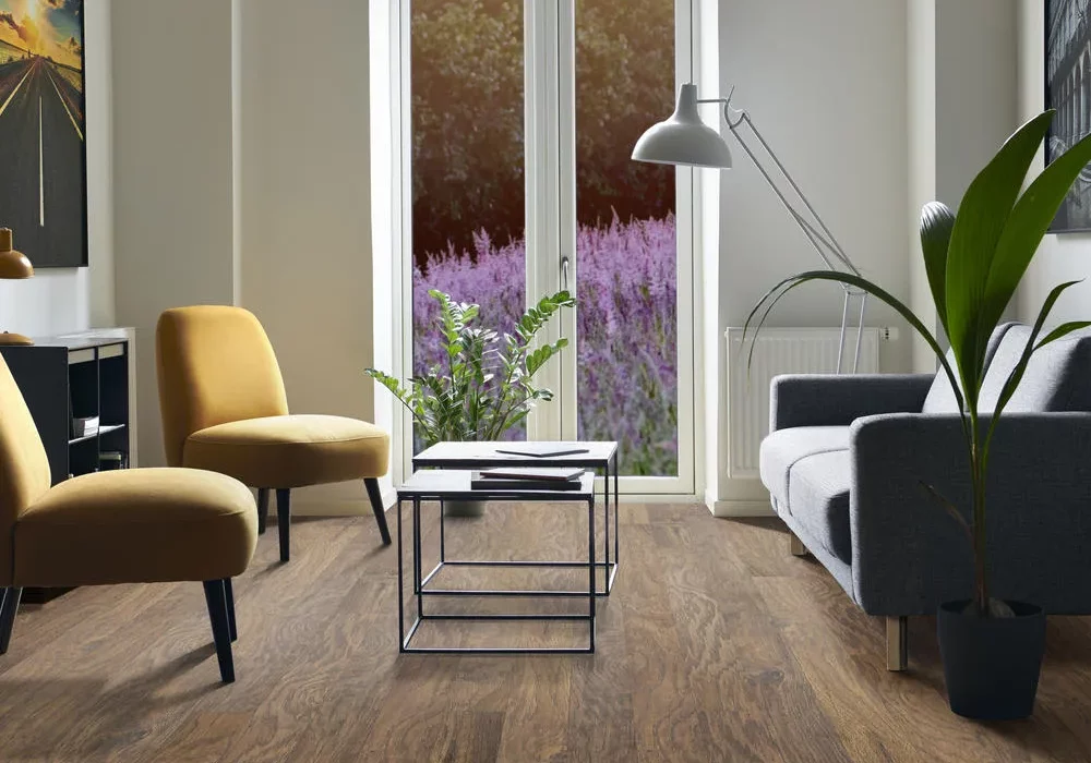 Scraped Hand scraped laminate flooring in contemporary sitting room with modern furniture